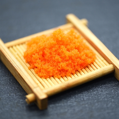 Masago Tobikoのカラフトシシャモの魚の卵の寿司の飛魚座の卵の凍結するカラフトシシャモ