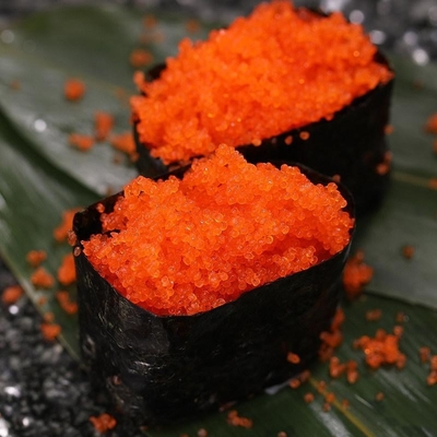 Masago Tobikoのカラフトシシャモの魚の卵の寿司の飛魚座の卵の凍結するカラフトシシャモ