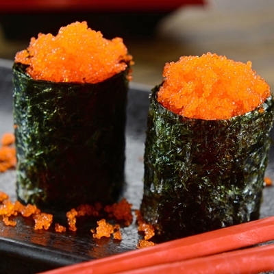 Masago Tobikoのカラフトシシャモの魚の卵の寿司の飛魚座の卵の凍結するカラフトシシャモ
